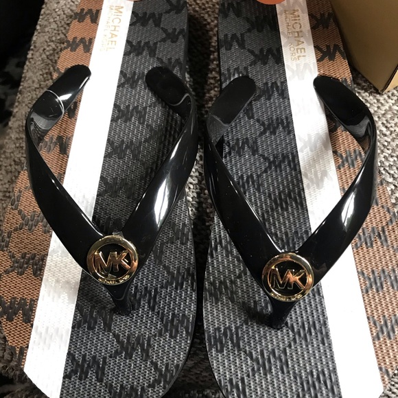 Michael Kors Shoes - BRAND NEW MICHAEL KORS BLACK MULTI FLIP FLOPS.